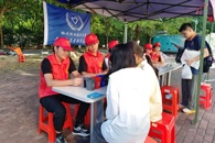 校青年志愿者服务总队开展“碳路先锋 绿动未来”环保宣传活动